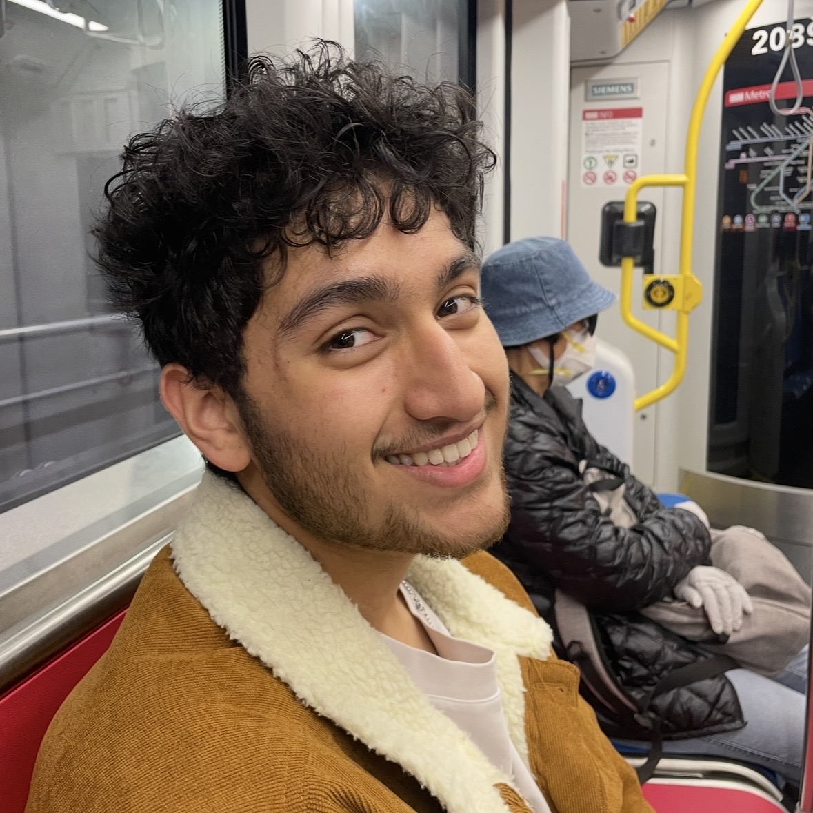 Ronak Chakraborty standing on a train platform